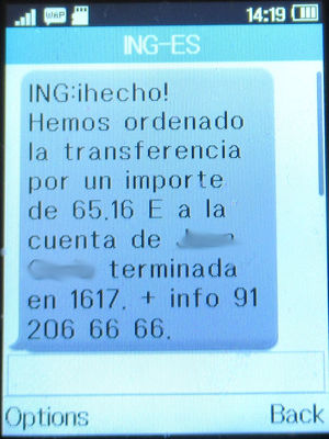 ING Direct, Spanien, SMS Bestätigung Überweisung im Mai 2023 auf einem Alcatel 2051X Mobiltelefon