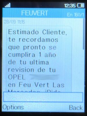 Feu Vert, Madrid, Spanien, Feu Vert SMS mit Hinweis Fahrzeug Wartung im September 2024 auf einem Alcatel 2051X