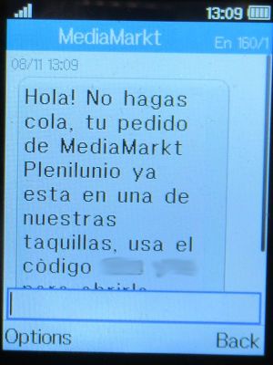 Media Markt®, Madrid, Spanien, SMS Abholung Bestellung möglich auf einem Alcatel  2051X